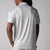 Gray background, image showing the back of a male model wearing the JOOLA Men's Club Printed Polo, Safari Leopard print.