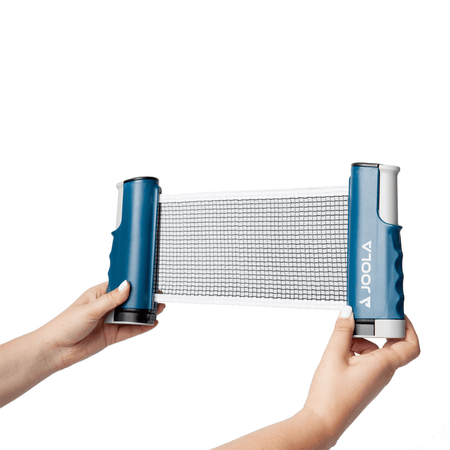 Two hands holding an extended JOOLA Retractable table tennis net.