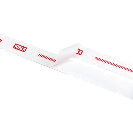 White background, close up image of an unrolled roll of JOOLA Pro IV edge guard tape.
