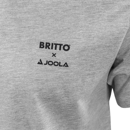 White Background Image: Front side of Heather grey BRITTO x JOOLA shirt, small BRITTO x JOOLA Logo on the right breast.