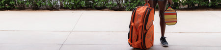 Horizontal banner image of a orange JOOLA Tour Elite Pro Pickleball Bag.