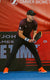 Image of JOOLA pro Collin Johns holding the JOOLA Scorpeus 3S pickleball paddle.