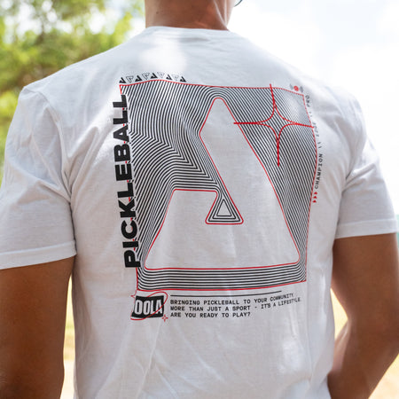 Person wearing a JOOLA white t-shirt with Pickleball branding on the back.