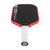 Red and black pickleball paddle with white handle on a white background