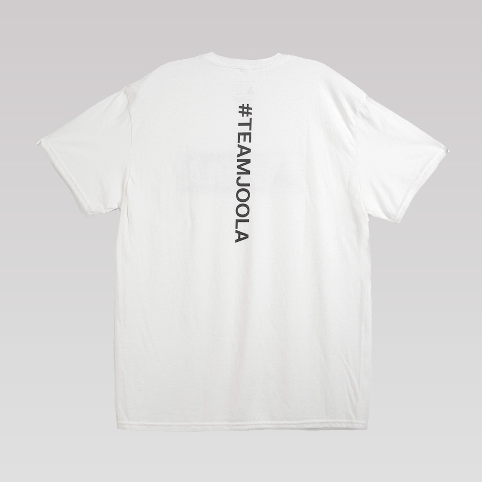 Gray gradient background, product image of a white JOOLA graphic tee with #TeamJOOLA down the center back of the shirt.