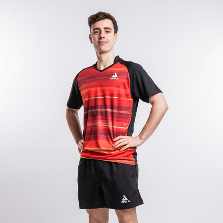 Model wearing a JOOLA Solstice Table Tennis Shirt, Black and Red.