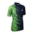 White Background Image: Angled view of the Navy and green JOOLA Sygma Polo. #Navy/Green