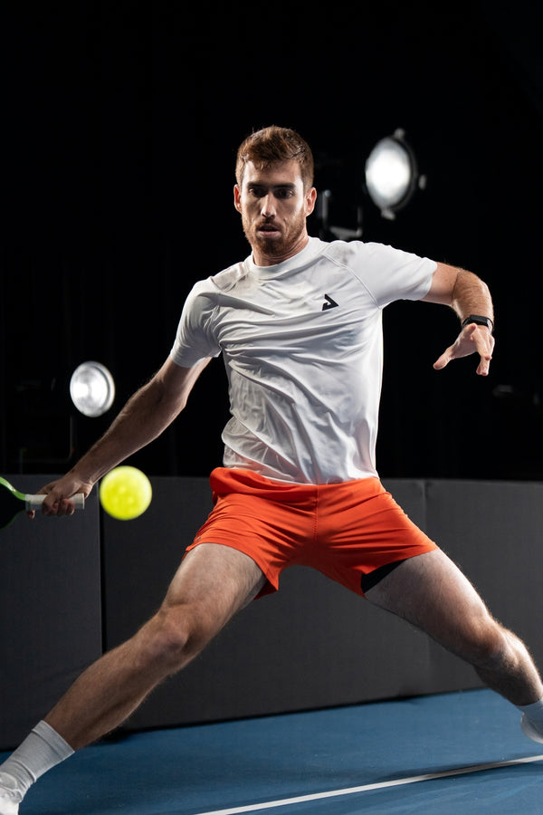 JOOLA Pro Federico Staksrud about to hit a pickleball with his Kosmos Pro V.