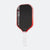 Pickleball paddle with black surface, red edges, and white handle on a white background