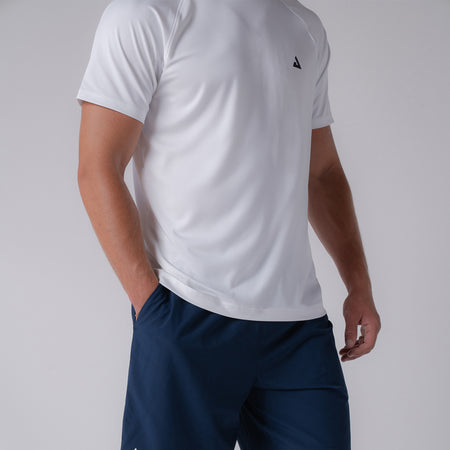 Image of a male models torso who is wearing a JOOLA Men's Court Short Sleeve White shirt.