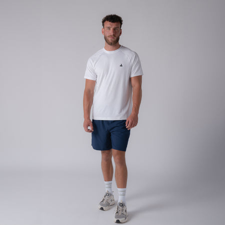 Image of a male model wearing a JOOLA Men's Court Short Sleeve White shirt.