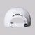 The back view of a white JOOLA essential hat with adjustable strap.