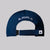 The back view of a navy JOOLA essential hat with adjustable strap.