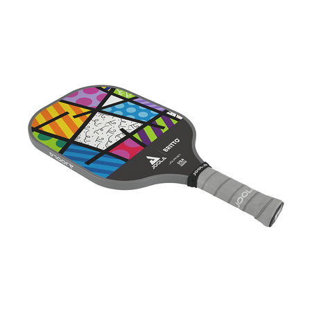 White Background Image: JOOLA x BRITTO paddle, grey handle, colorful paddle face in BRITTO art style.