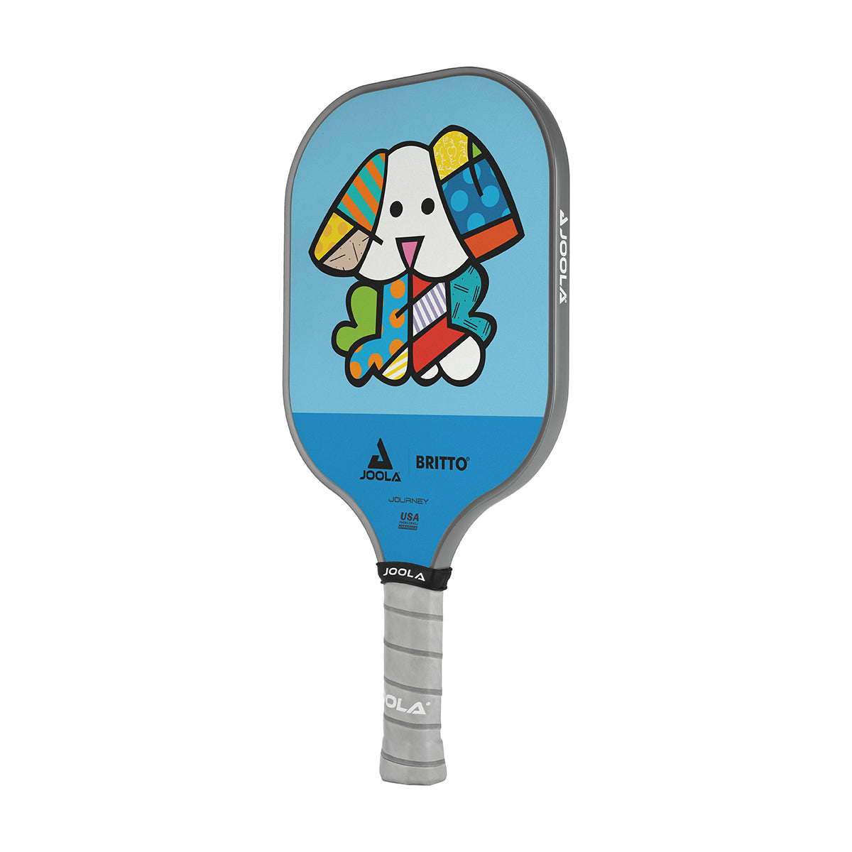 White Background Image: JOOLA x BRITTO paddle, grey handle, blue and light blue paddle face with an image of a dog.