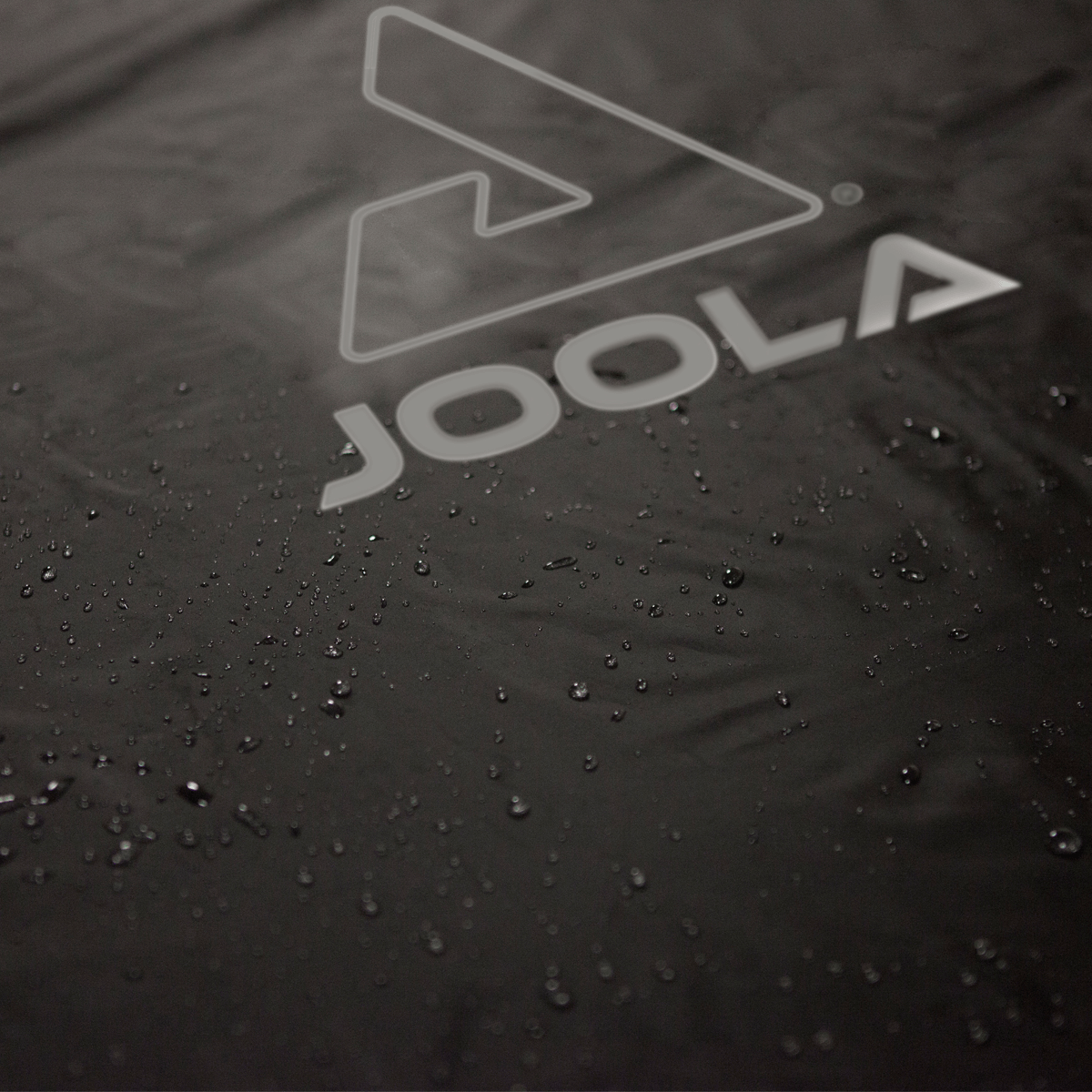 White background Image: Outdoor table tennis cover for the JOOLA Berkshire Table Tennis table.