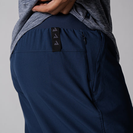 Image showing the JOOLA trinity logo and zipper on a pair of JOOLA men's club joggers, navy.