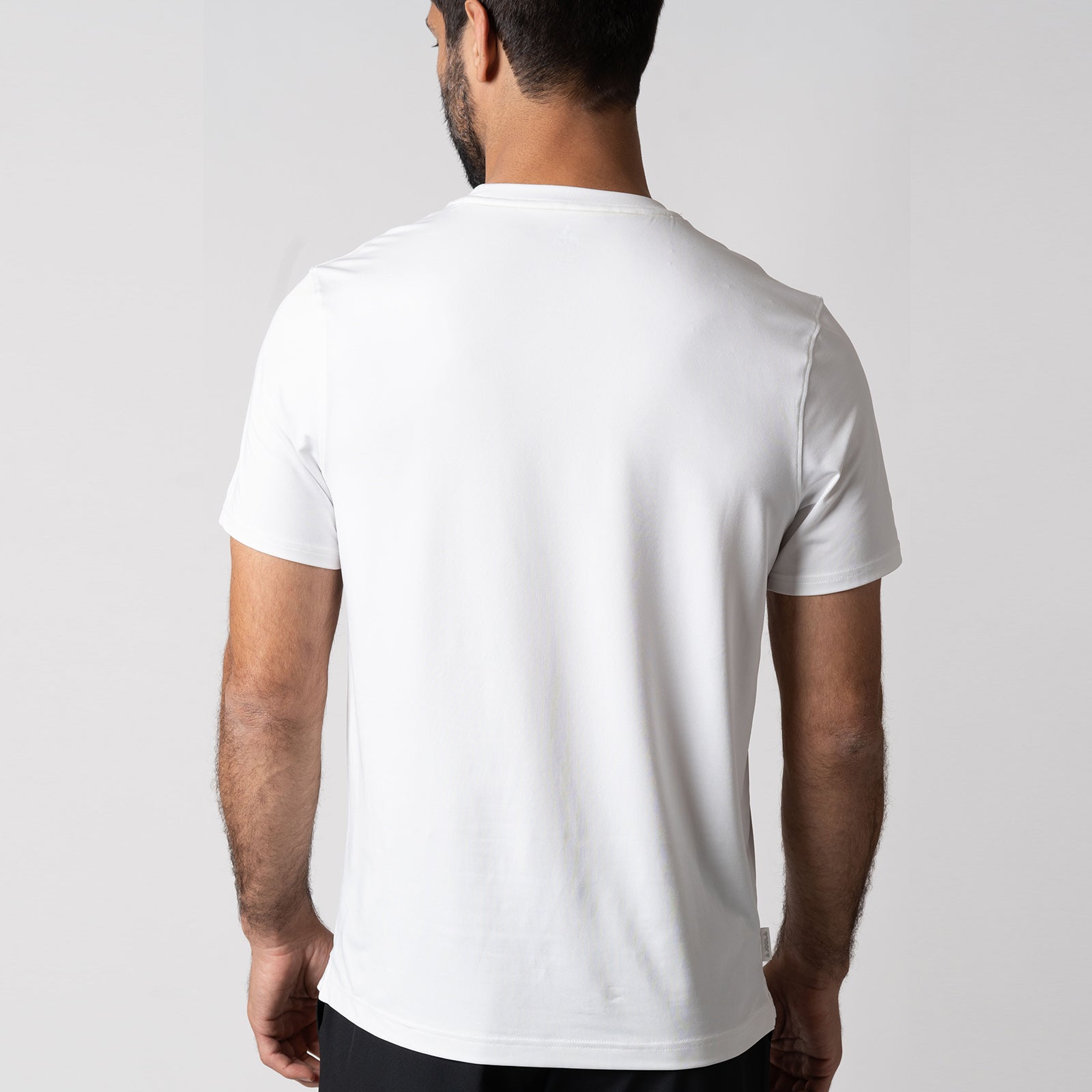 Image of the back of JOOLA Men's Club Short Sleeve Shirt, White.