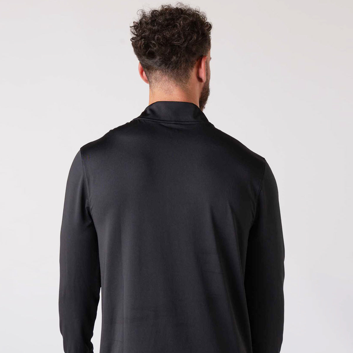 Image of a male model wearing a JOOLA Men's Quarter Zip Pullover, black.