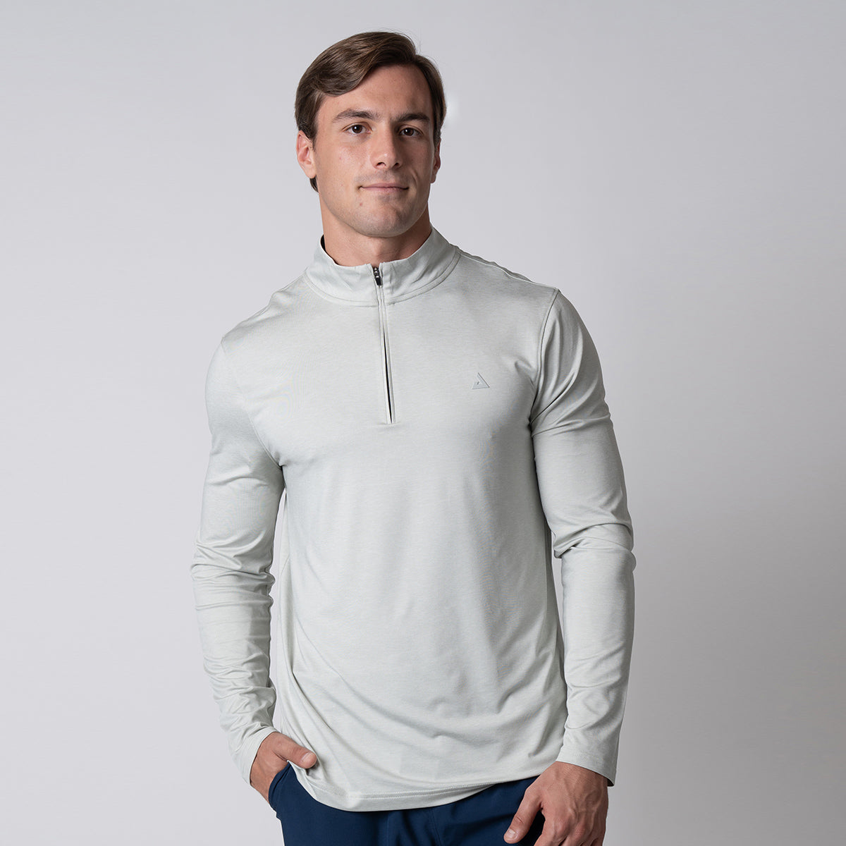 Image of a male model wearing a JOOLA Men's Quarter Zip Pullover, Gravity Gray Heather.