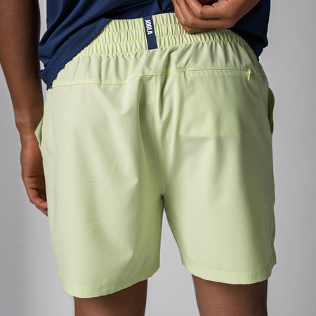 Close up of the back of a JOOLA Men's Woven Shorts, 5-inch inseam, key lime.