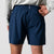 Close up image showing the back of a pair of JOOLA Men's Woven Shorts, 5-inch inseam, navy.