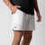 Close up view of the a pair of Men's Woven Shorts, 5-inch inseam, white.