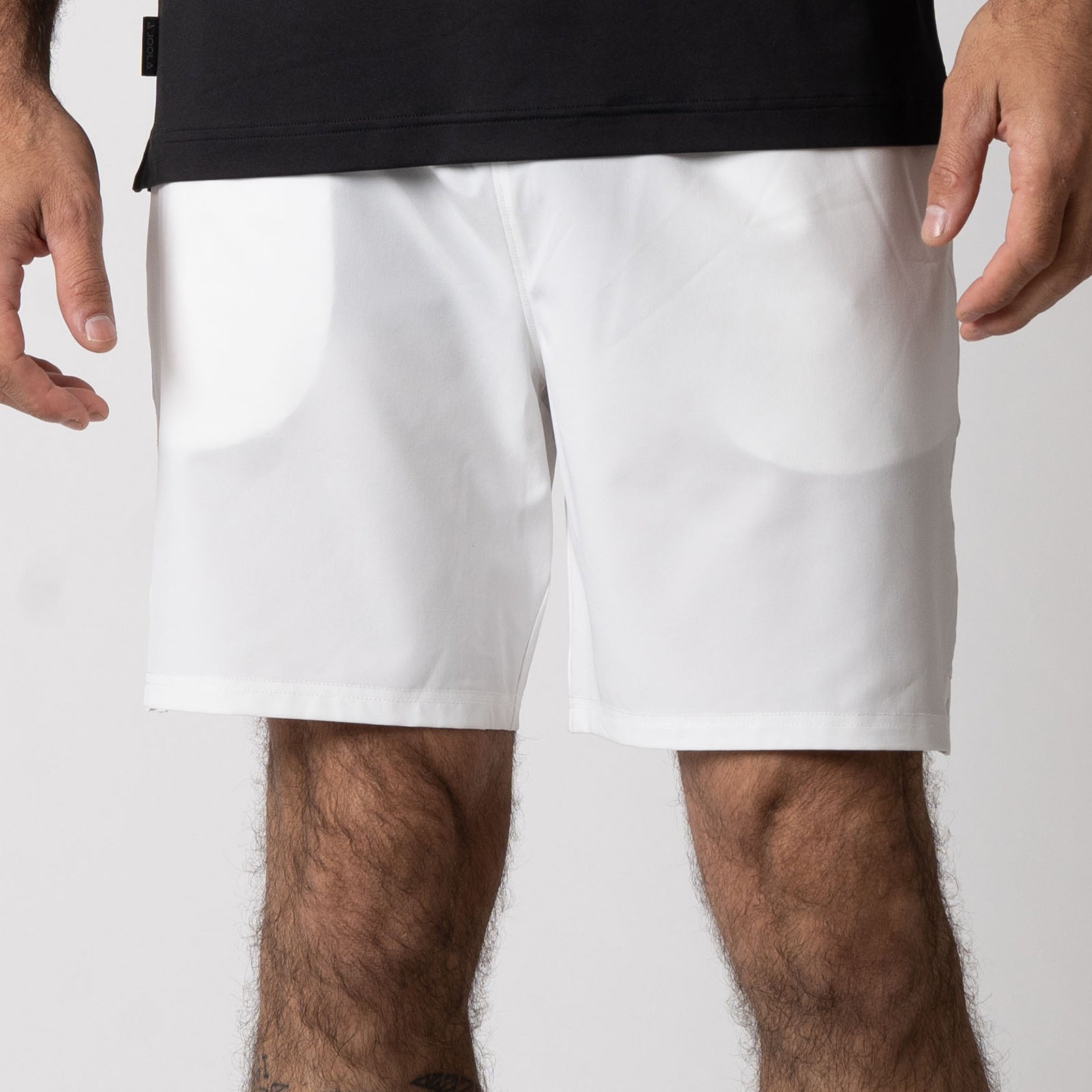 Close up image of the JOOLA Men's Woven Shorts, 7-inch, white.