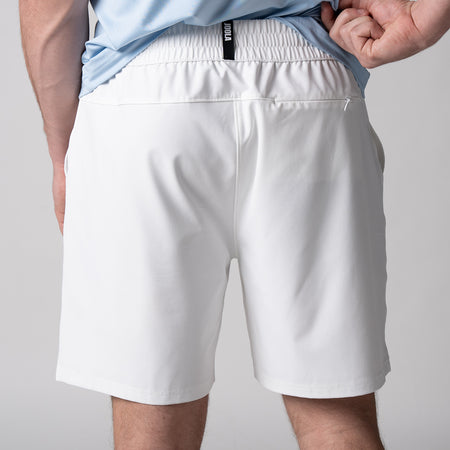 Close up of the back of a pair of JOOLA men's woven shorts, 7-inch inseam, white.