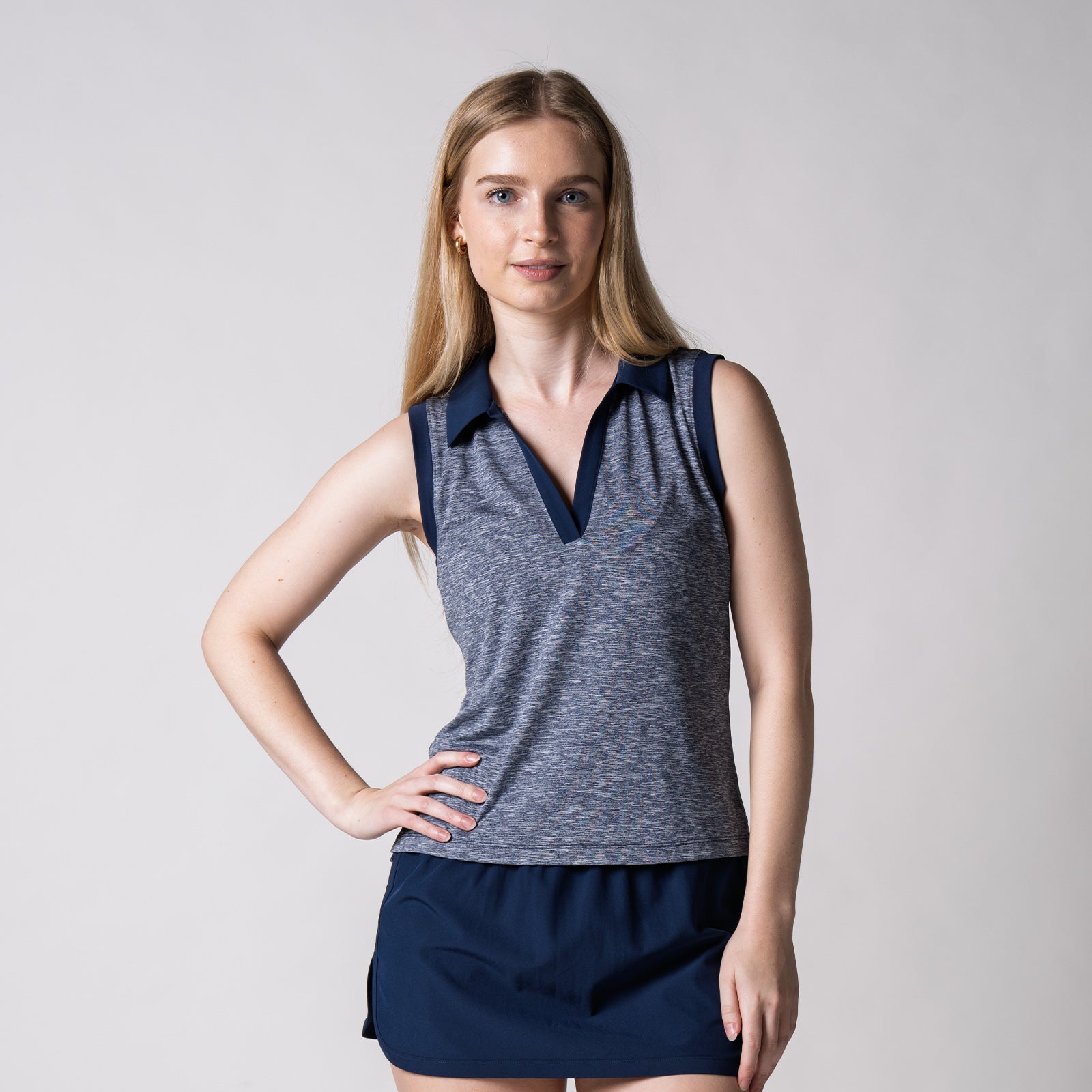 Image of a female model wearing a JOOLA Women's Club Sleeveless Polo, Navy.