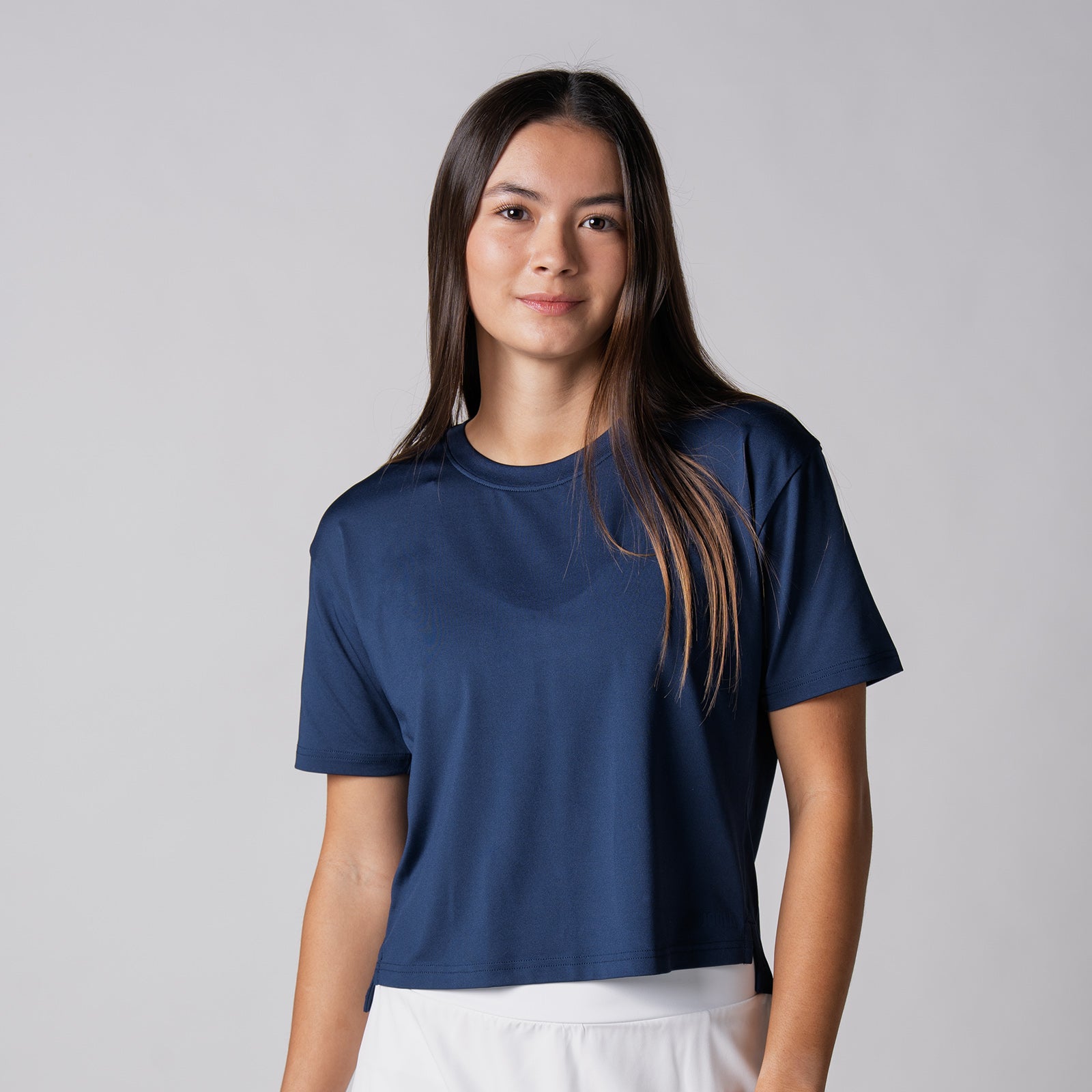 Image of a female model wearing a JOOLA Women's Court Crop Tee, Navy.