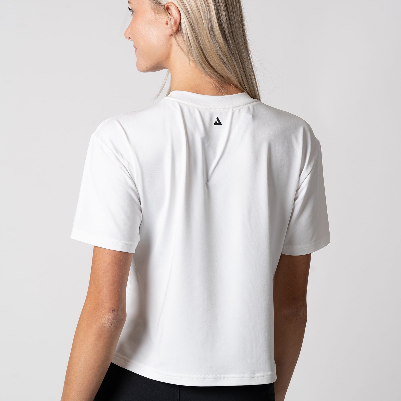  Image of the back of a JOOLA Women's Court Crop Tee, White.