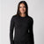 Image of a female model wearing a JOOLA Women's Court Long Sleeve Shirt, Black.