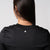 The back of a JOOLA women's court long sleeve shirt, black.