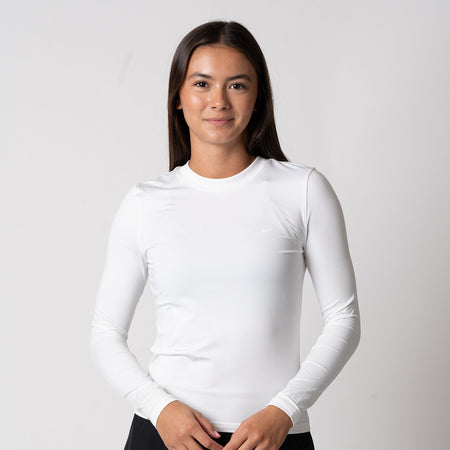 Image of a female model wearing a JOOLA Women's Court Long Sleeve Shirt, white.