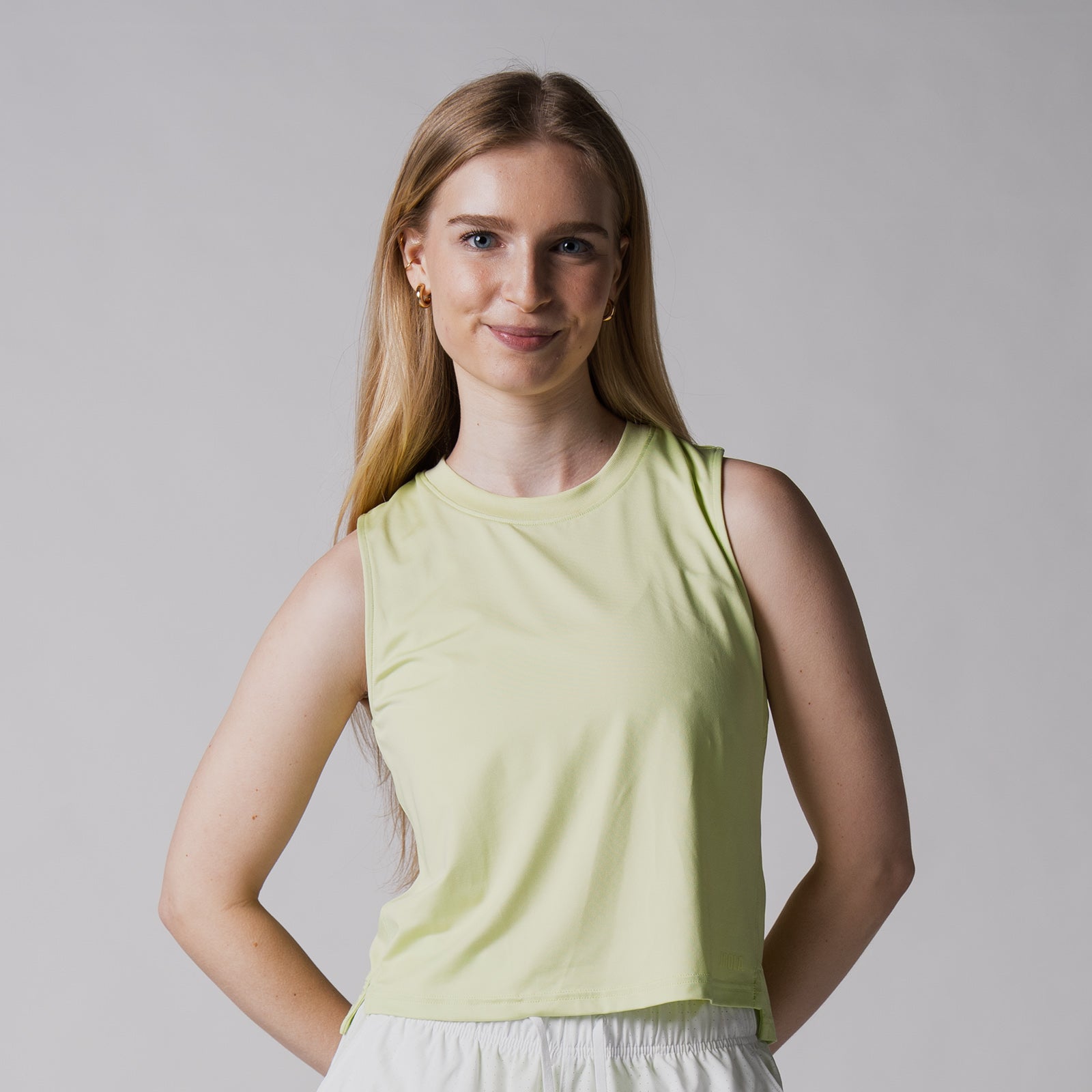 Image of a female model wearing a JOOLA Women's Court Tank Top, Key Lime.