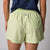 Image of the back of a pair of JOOLA Women's Court Woven Shorts, Key Lime.