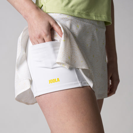 Close up on the side of a JOOLA Women's Pickleball Printed Skort, Serpentine White.