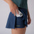 Close up image of the pocket in the undershorty of a JOOLA women's pickleball skort, navy.