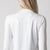 Image showing the back of a JOOLA Women's Quarter Zip Pullover, White.