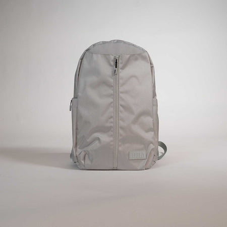 Gray JOOLA backpack on a light gray background.