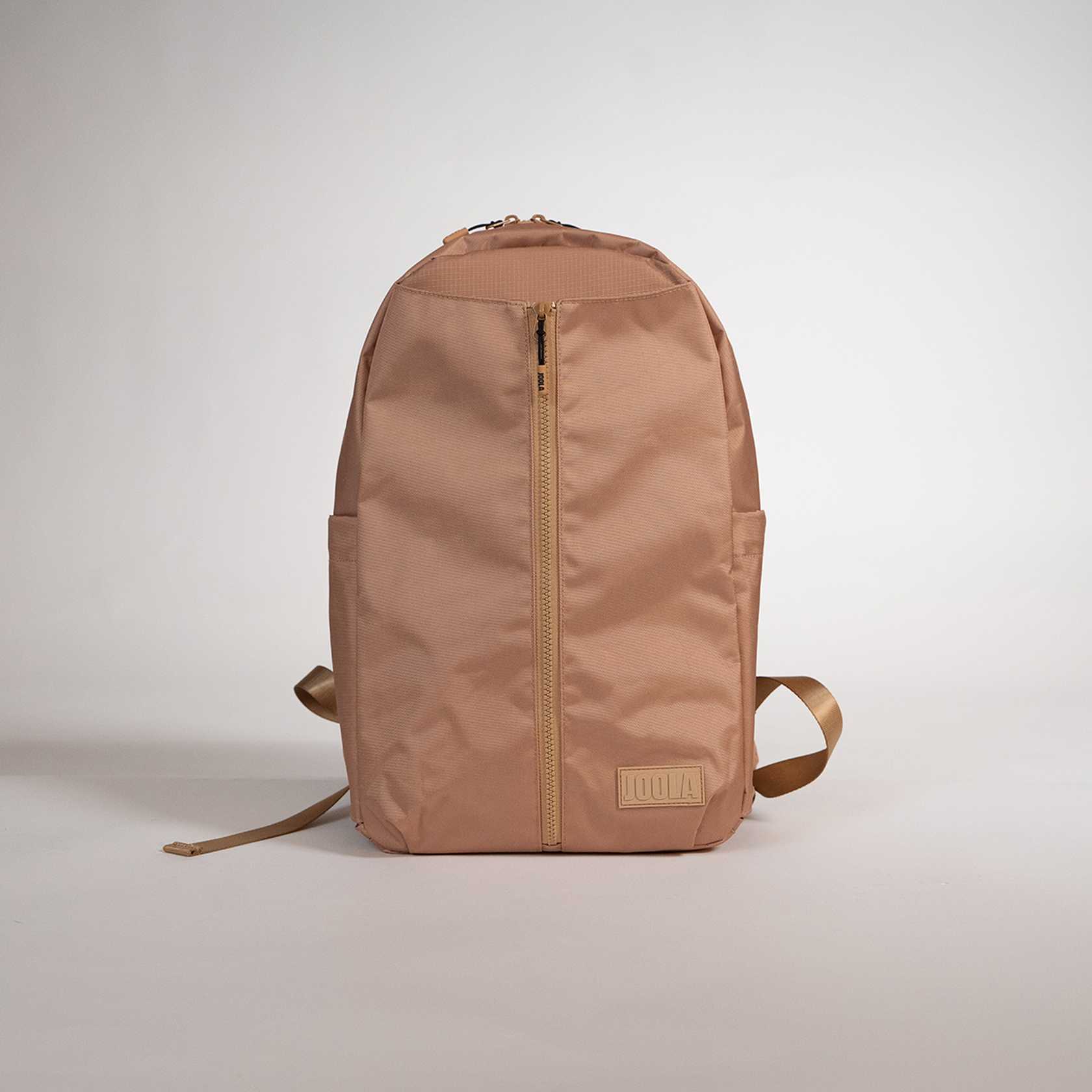 Brown JOOLA backpack on a light gray background.