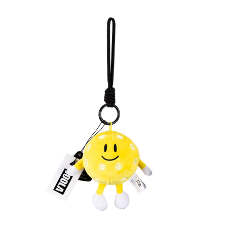 Image of a yellow JOOLA Pickleball plushie with a JOOLA tag.