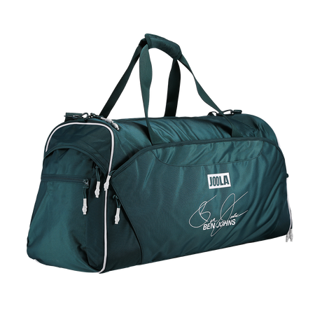 A dark teal green JOOLA duffel bag with white piping and a personalized Ben Johns signature print on the front, shown on a solid white background.