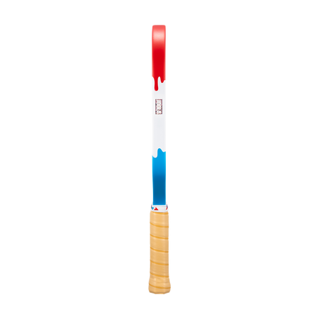 Image showing the red, white and blue drippy colorway and the brown handle of the JOOLA Rally Rocket pickleball paddle.