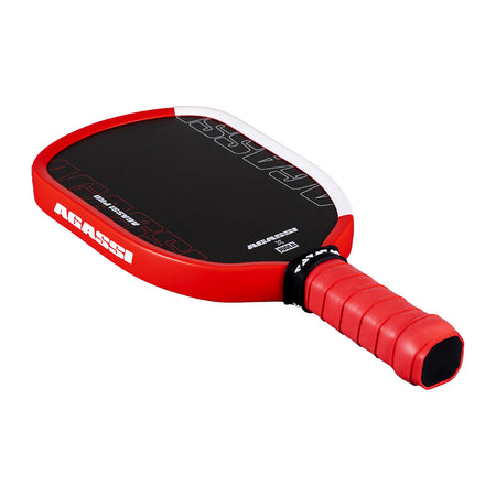 White background, miniature Agassi Pro Pickleball paddle collectors item.