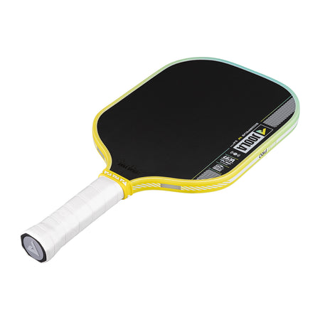 Pickleball paddle with black surface and yellow frame on a white background.