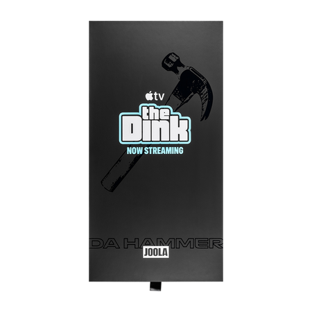 A black rectangular stand or plaque featuring a hammer graphic and the text 'The Dink NOW STREAMING' with Apple TV branding, plus 'JOOLA' near the bottom, shown on a white background.