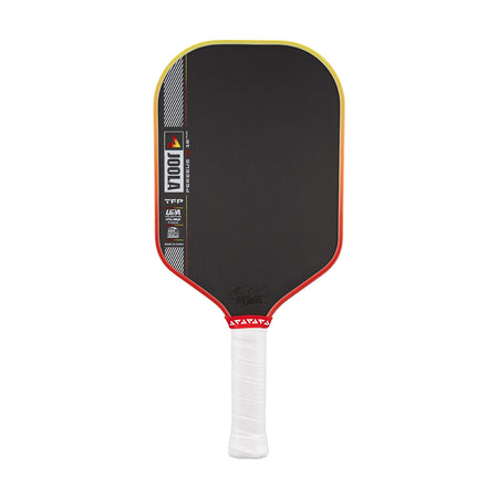 Pickleball paddle with black surface, red border, and white handle on a white background