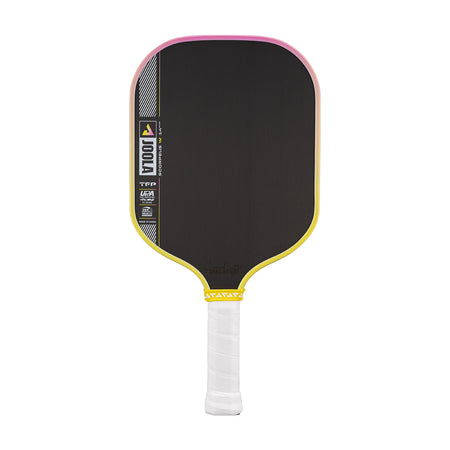 Pickleball paddle with black surface, yellow rim, and white handle on a white background.